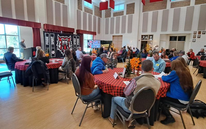Megan Horn/The Clayton Tribune. The families of the students along with school administrators and community supporters attended the REACH Scholarship Signing Ceremony at the Rabun County High School (RCHS) Fine Arts Building Band Room Nov. 21.