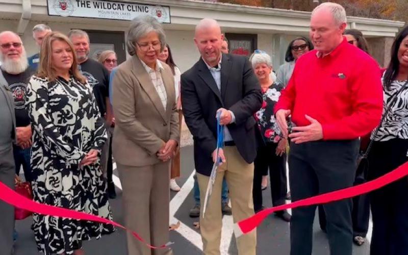 Photo courtesy of Forward Rabun/Rabun County Chamber of Commerce. Community members celebrate as Forward Rabun/Rabun County Chamber of Commerce cut the ribbon on The Wildcat Clinic at the Rabun County Board of Education complex. The clinic opened on Oct. 7.
