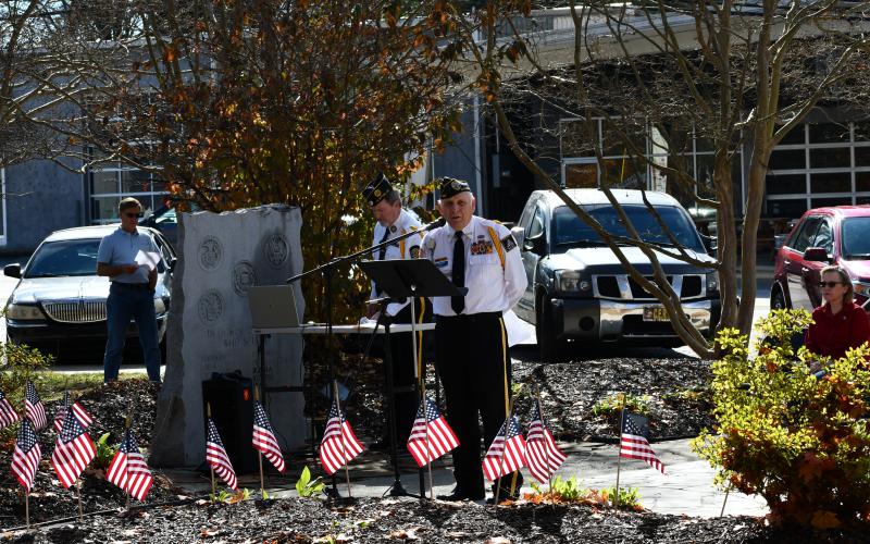 Megan Horn/The Clayton Tribune. Major (RET) Doug Wayne-DAV Ch. 15, Post 220, VFW Post 4570, SCV Camp 1929 welcomes the crowd of attendees on Nov. 11.