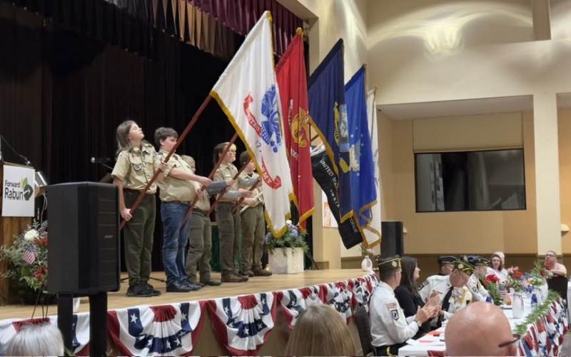 Photo courtesy of Forward Rabun/Rabun County Chamber of Commerce. Boy Scout Troops 6 and 19, led by David Cross, present the Branch Flags for each branch of the military along with their anthems to honor the Army, Marine Corps, Navy, Air Force, Coast Guard and Space Force at the 25th annual Veterans Appreciation Dinner Nov. 7.