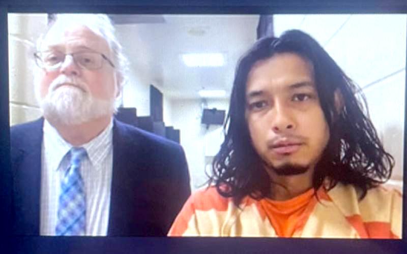 Submitted photo. Angel DeJesus Rivera-Sanchez (right) appears with Public Defender Drew Powell in Habersham County Magistrate Court on Nov. 1 in this video screenshot.