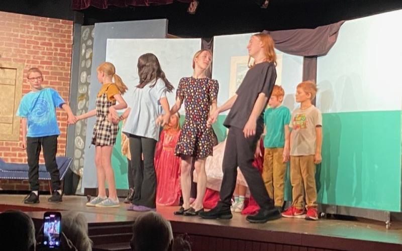 Submitted photos.  Students ages 6 to 15 performed at the North Georgia Community Players Youth Theatre Program on stage Sunday, Nov. 24. Youth Program participants are Luke Arnett, Lucy Arnett, Abbie Boggs, Linus Freeman, Johnna Haas, Louisa Loveland, Dylan Mason, Maela Radcliffe, Antonella Singleton, Harriet Wheatley and Leo Wheatley. Below: Louisa Loveland, Leo Wheatley and Maela Radcliffe participate in the North Georgia Community Players Youth Theatre Program and perform “The Big Show” on stage Nov. 24