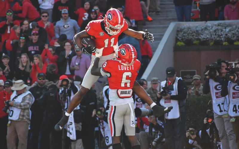 Wade Cheek/The Clayton Tribune. Georgia wide receivers Dominique Lovett and Arian Smith will surely be key for the Dawgs’ success against No. 2 Texas in this weekend’s SEC Championship meeting.