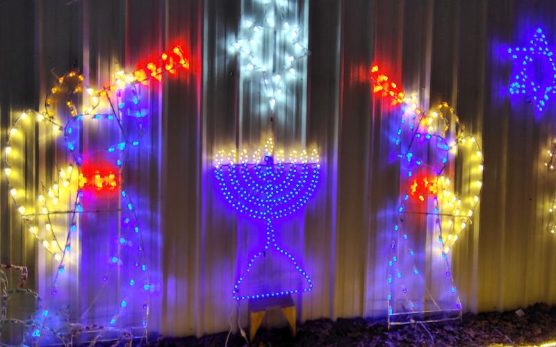 Megan Horn/The Clayton Tribune. Hanukkah decorations are among many at the Village of Lights in Tiger this weekend.