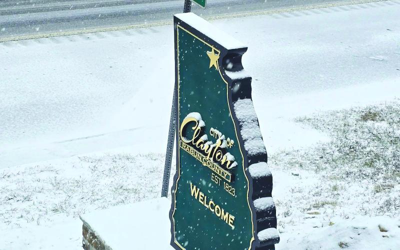 Enoch Autry/The Clayton Tribune. Just days after its completion, Clayton’s new sign receives a dusting of snow.