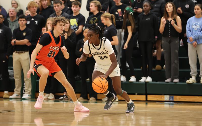 Wade Cheek/The Clayton Tribune. Sophomore shooting guard Brian Neely Jr. (24) scored nine points in the Indians’ region basketball game against George Walton Academy on Monday, Jan. 27. TFS defeated the Bulldogs 59-42.