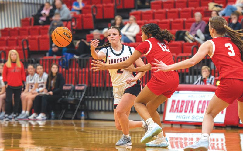 Wade Cheek/The Clayton Tribune. Junior Conley Spivey looks for open space on a fast-break against Providence Christian. The Lady Cats are 9-7 on the season.