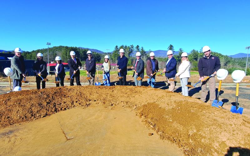 Megan Horn/The Clayton Tribune. Pictured are Allen Blair, RCHS assistant principal; Kelsey Thompson, RCHS assistant principal; Cindi Dean, chief financial officer; Matt Remillard, RCSS assistant superintendent; Scott Horton, school board member; Bailey Weber, RCHS student, Class of 2027; Justin Spillers, RCHS principal; Steven Cole, RCSS superintendent; Steven Cabe, school board chair; Jonathan Welch, RCHS athletic director; Kelly McKay, RCSS assistant superintendent; Jason Hogan, RCSS facilities director.