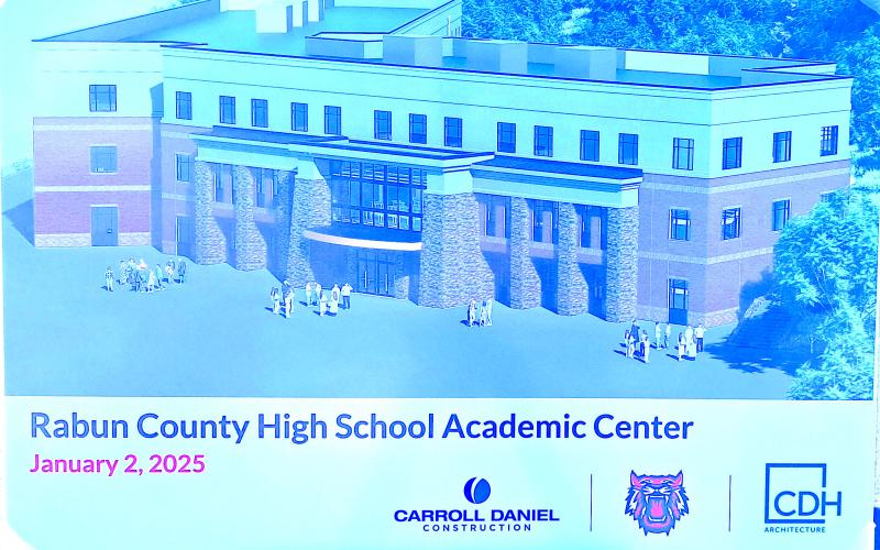 Megan Horn/The Clayton Tribune. Pictured is a rendering of the new Rabun County High School Academic Center that’s set for completion in summer 2026. A copy of the rendering was available to view at the Jan. 2 ground breaking on the high school’s property.