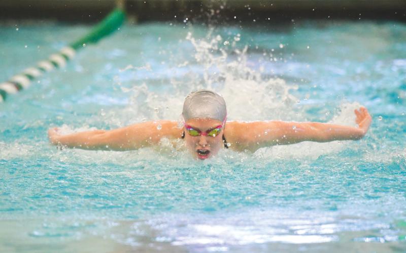 Wade Cheek/The Clayton Tribune. Senior swimmer, TFS record holder ,and Cincinatti-commit Madison Dampier took first place in the women’s 50m freestyle and the 100m Butterfly at the TFS “Light of the Mountains” Invitational that featured 15 teams on Saturday, Jan. 18.