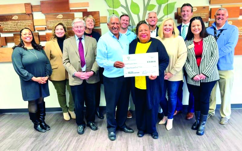 Submitted photo. At the Community Grants Celebration, the NGCF Team and board members stand with Sunshine Seniors, one of this year’s recipients.
