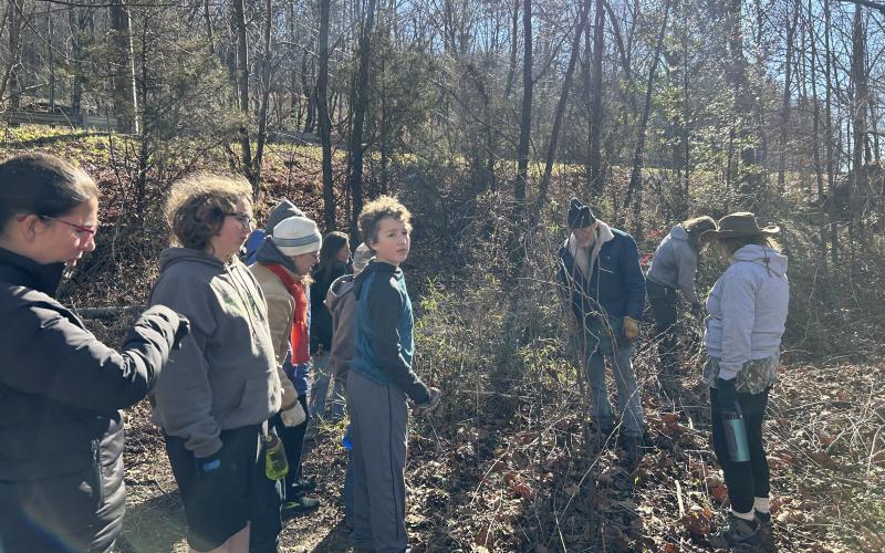 Submitted photo. Buzz Williams, program specialist for Chattooga Conservancy, helps educate everyone on native plant identification at the Stekoa Creek Park Cleanup Day Saturday, Jan. 4.