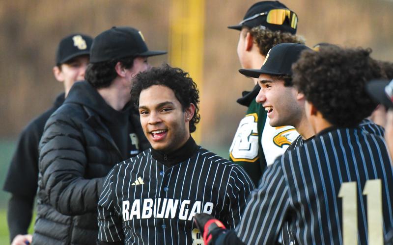 Wade Cheek/The Clayton Tribune. Senior catcher and Coastal Alabama signee Jeff Diaz cracks a smile after his first of two home runs against Tallulah Falls School. Diaz also had four runs-batted-in in the victory on the road.