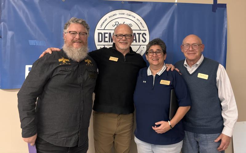 Submitted. During the Feb. 10 Rabun County Democrats meeting, three new members were elected to the Democrats Executive Board. Pictured are Rabun County Democrats Chair Don Martin, center, welcoming new members Matt Price, Kim Spears and Ray Mayer.