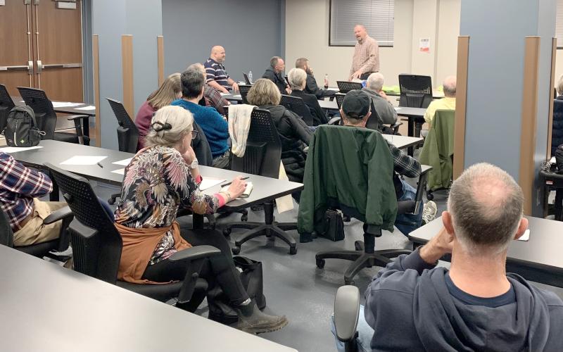 Submitted photo. A group of people listen to Rabun County EMS Capt. Trampes Stancil discuss health risks on Jan. 28 at the quarterly public health talk.