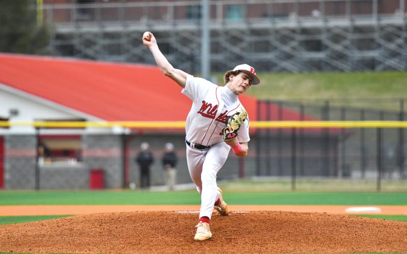 Wade Cheek/The Clayton Tribune. Rabun freshman Chase Alonso slings a pitch in the Wildcats' 13-6 loss to Providence Christian Academy on Tuesday, March 4.
