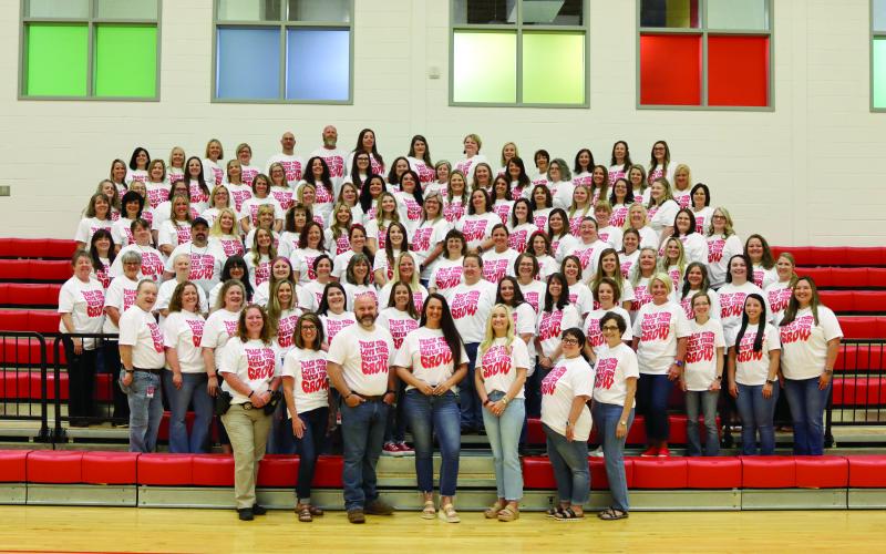 Photo courtesy Rabun County Schools. The Rabun County Primary School administration and teachers are all smiles after earning the Title I Distinguished School honor.