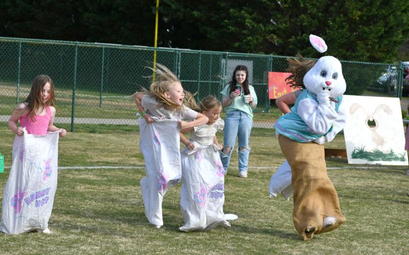 Enoch Autry/The Clayton Tribune. The Easter Bunny got so into the sack race that his ear popped off.