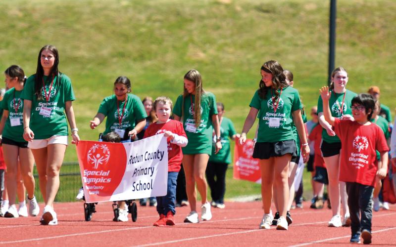 Wade Cheek/The Clayton Tribune.  Rabun County School System hosted Special Olympics last Thursday, April 17, after not having the event for six years. Students take part in the opening ceremony.