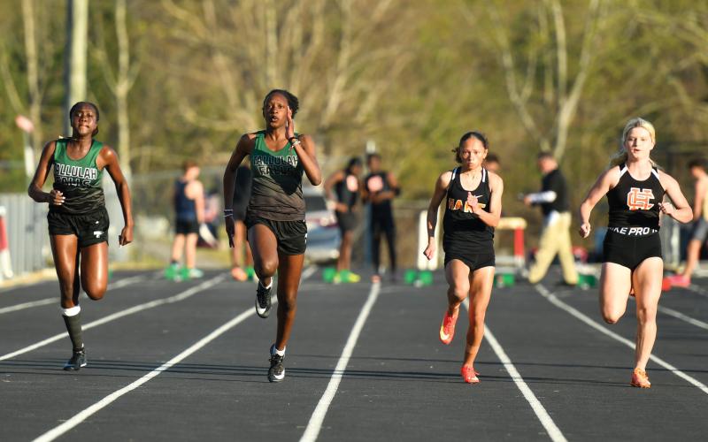 Wade Cheek/The Clayton Tribune. The Tallulah Falls School girls track and field team had five Lady Indians finish within the top 10 of the girls 100-meter dash event at Stephens County High School on Thursday, March 27.