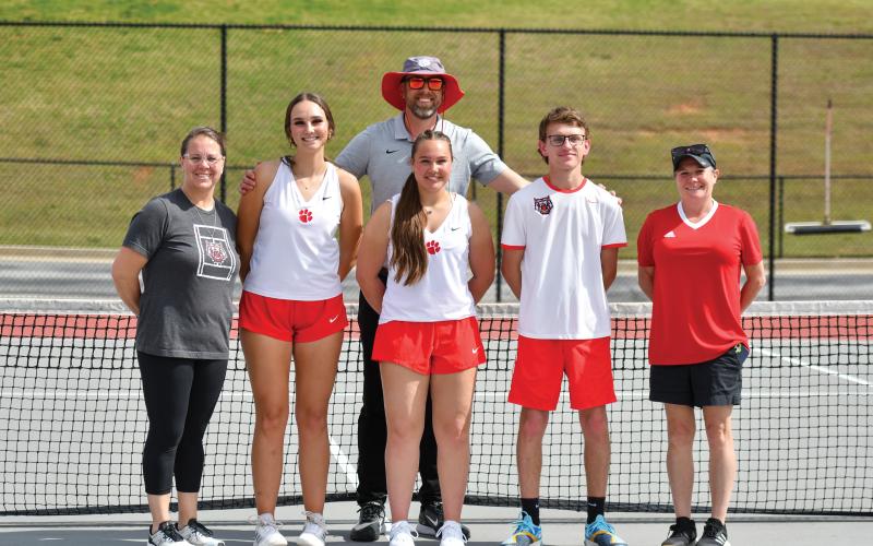 Wade Cheek/The Clayton Tribune. The RCHS tennis program honored its Class of 2025 prior to its region match with Barrow Arts and Sciences Academy. This year’s senior tennis group includes Lady Cats Lucy Harvey and Ruby Richardson, and Wildcat Robbie Fountain. The three are joined by coaches (from left) Jennifer Ramey, Bryan Getty and Laura Quinn.