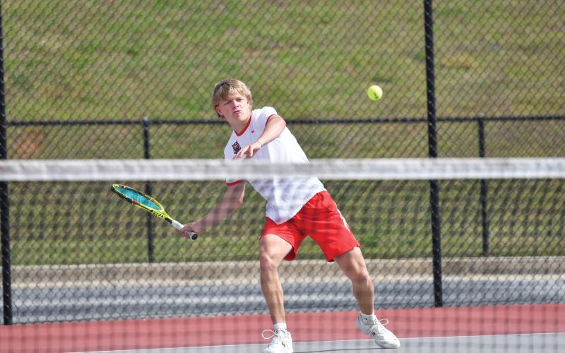 Wade Cheek/The Clayton Tribune. Sophomore singles player Landan Bedingfield won his No. 1 singles bout (6-0, 6-0) during Rabun’s region win over BASA at home.