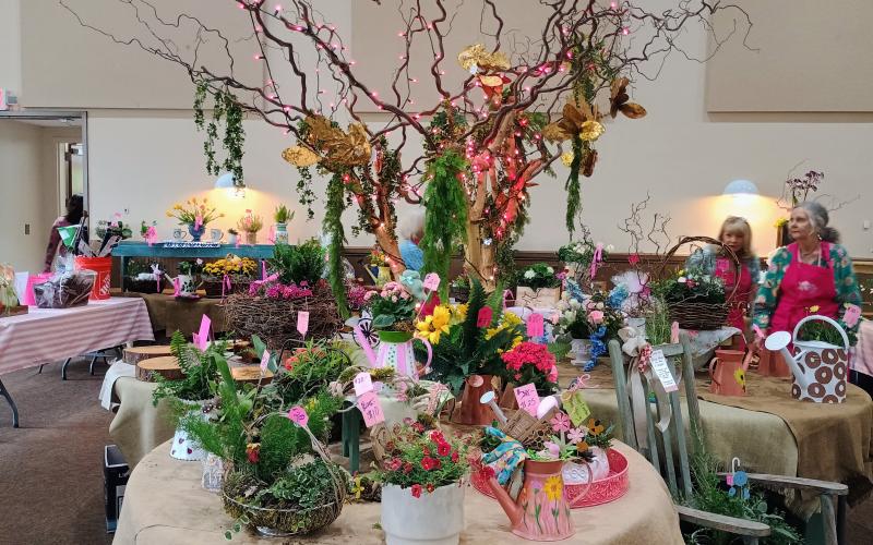 Megan Horn/The Clayton Tribune. There were many beautiful creations made by Mountain Ivy Garden Club members at the marketplace during the second annual symposium event.
