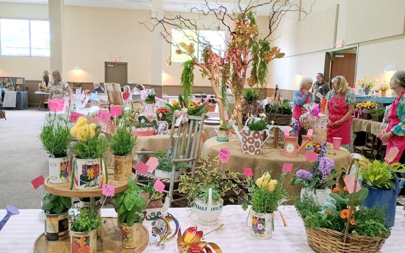 Megan Horn/The Clayton Tribune. There were many beautiful creations made by Mountain Ivy Garden Club members at the marketplace during the second annual symposium event.