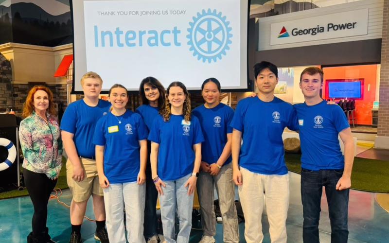 Photo courtesy of Tallulah Falls School. Clayton Rotary President Sheryl Webster, Tate Colston, Emma Ivester, history teacher Nancy Almoyan, Carsyn Griffis, Emily Cai, Danny An, and Timothy Beck participate in the annual Interact Conference in Cumming, Georgia.
