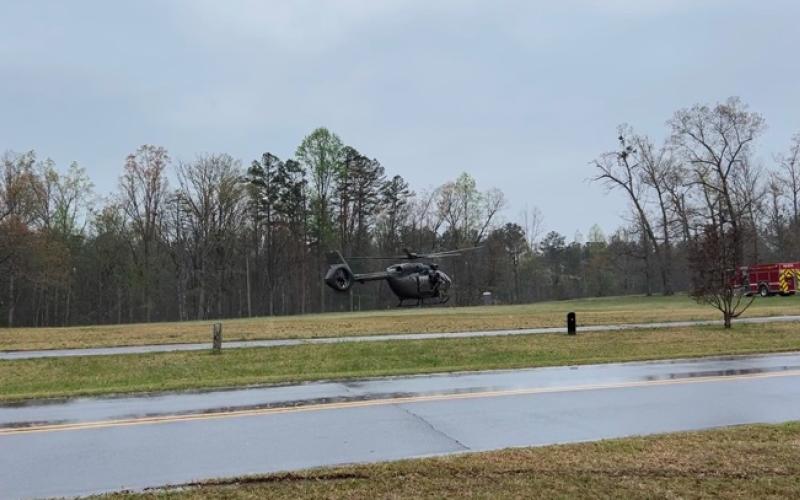 Screenshot of a video courtesy of Corporal Jimmy Watt/PIO/Oconee County Sheriff’s Office. A South Carolina National Guard helicopter brings Carrell Wayne Fowler and Sharon Kay Bramlett to a Landing Zone.