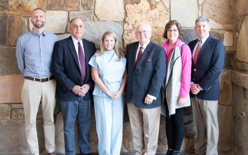 Photo courtesy Tallulah Falls School. Kevin Flinn, Cary Brague, Trish Cobourn, Dr. Larry A. Peevy, Carolyn Ronco and Jack Talmadge meet together during the SAIS re-accreditation committee’s visit to the Tallulah Falls School campus.