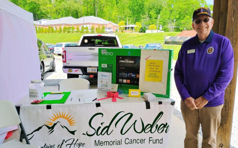 Megan Horn/The Clayton Tribune. Proceeds from Dinglerfest 2025 on May 3 and 4, presented by Rabun County local Charlie Dingler, benefitted Sid Weber Memorial Cancer Fund. Sid Weber Memorial Cancer Fund Board Member Bruce Grant greets people during the event.