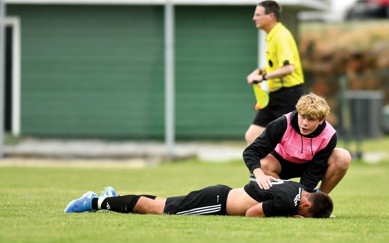 Wade Cheek/The Clayton Tribune.  Senior Cole Borchers reacts to no-longer being a TFS soccer player, just seconds after the 3-1 playoff loss to St. Anne-Pacelli on Saturday, May 24.