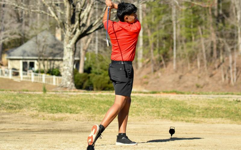 Wade Cheek/The Clayton Tribune. RCHS golfer Roberto Diaz won this year's area tournament as the top individual with a 74 on the score card.
