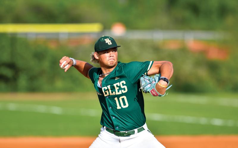 Wade Cheek/The Clayton Tribune. Senior pitcher Aiden Kitchings hurls a pitch in Rabun Gap's 8-0 win over Tallulah Falls School on April 30.