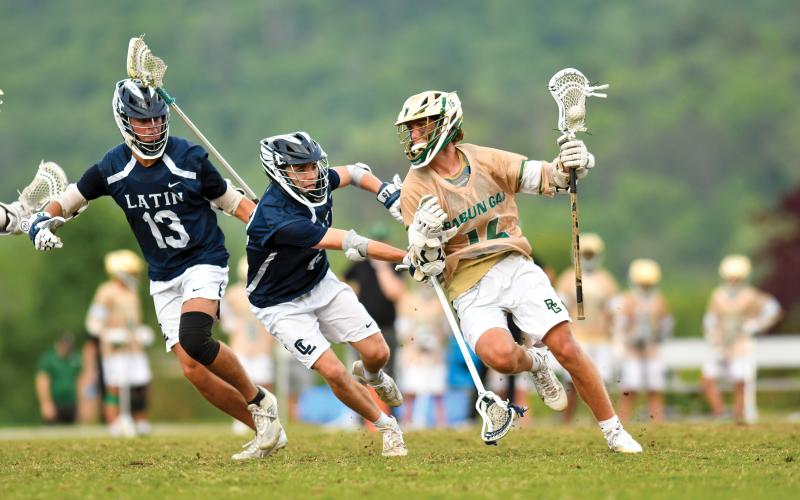 Wade Cheek/The Clayton Tribune. Junior attackman Kayden Mace charges towards the goal in Rabun Gap’s 10-2 playoff win over Charlotte Latin on Friday, May 9. The Eagles will play the semifinal on Thursday, May 15, at Durham Academy (N.C.).