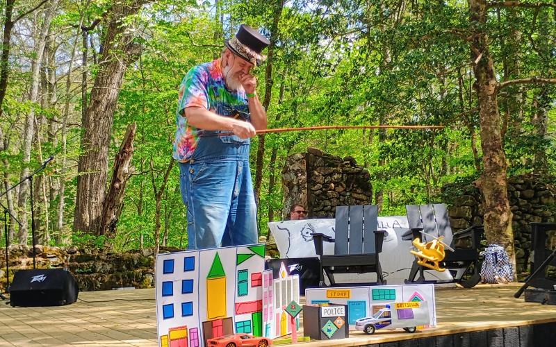 Megan Horn/The Clayton Tribune.  Rabun County local Charlie Dingler demonstrates his “Gritszilla” puppet show at the Hambidge Center Open House on Saturday, April 26.