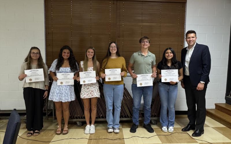 Submitted.  10th graders honored by the Clayton Lions Club are  Katheryn Wheeler (left), Ella Weber, Bailey Weber, Aubrey Richins, Lleyton Phillips and Esmeralda Antonio Hernandez pictured with Rabun County High School Principal Justin Spillers.