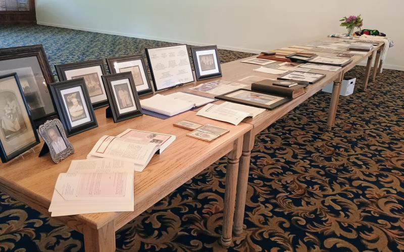 Megan Horn/The Clayton Tribune. Family members of the Dillard family reminisced about the past during the 2025 Dillard Family Association Reunion Saturday, April 26. Photographs and historical recordings were on display.