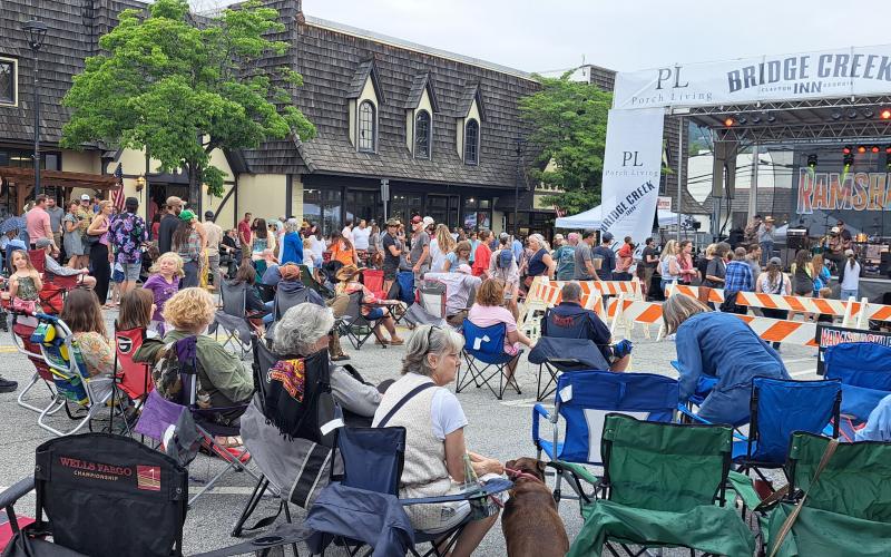 File/Megan Horn/The Clayton Tribune. Crowds of people dance and sing to the music of Scott Low &amp; The Blue Bouillon during last June’s Ramshackle event in downtown Clayton. This year’s June 7, 2025, second annual event features a lineup of different music genres.