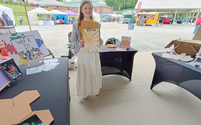 Megan Horn/The Clayton Tribune. Reese Bishop is a student at Edventures, an Innovative Hybrid Schooling located in Tiger. She featured some of her works during last Saturday’s Of These Mountains Spring MarketPlace.