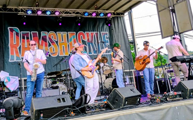Megan Horn/The Clayton Tribune. The Main Stage band Kobanova performs high-energy music during Ramshackle last Saturday. The band continued performing as rain began to fall on event-goers preceding an incoming storm.