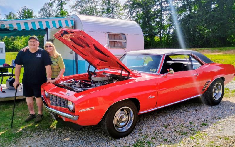 Megan Horn/The Clayton Tribune. Phil and Peggy Detore display their 1969 Camaro with a 454 motor and 5-peed transmission during the June 7 “Pharoahs Drive-In Movie Car Show 2025” held at the Tiger-Drive In.