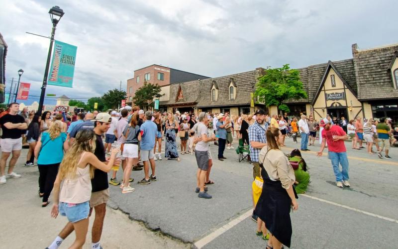 Megan Horn/The Clayton Tribune. Hundreds of people were in downtown Clayton last weekend for the second annual Ramshackle. Event-goers enjoy music on the Main Stage Saturday, June 7.
