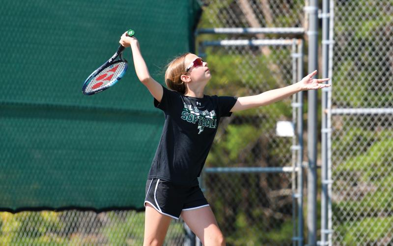 Wade Cheek/The Clayton Tribune. Ruby Sue Anderson gets ready for a serve at the Tallulah Falls School kids tennis camp on Wednesday, June 11.
