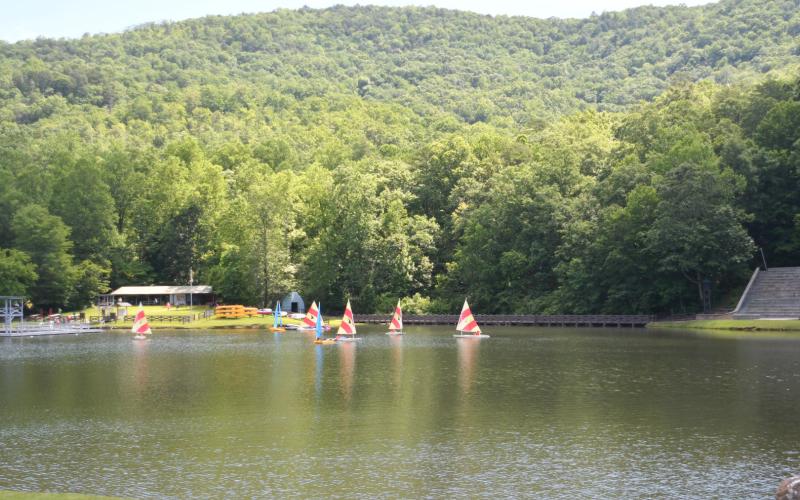 Enoch Autry/The Clayton Tribune. Lake Toccoa on the Camp Rainey Mountain property in Rabun County offers a scenic view of activity.
