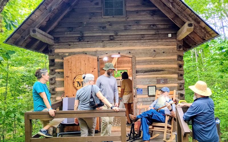 Megan Horn/The Clayton Tribune. Les Barnett with Mountain Man Music is a local who frequents Foxfire as a demonstrator. During Heritage Days Friday, June 6, and Saturday, June 7, he demonstrated his unique Panjos and Canjos to visitors.
