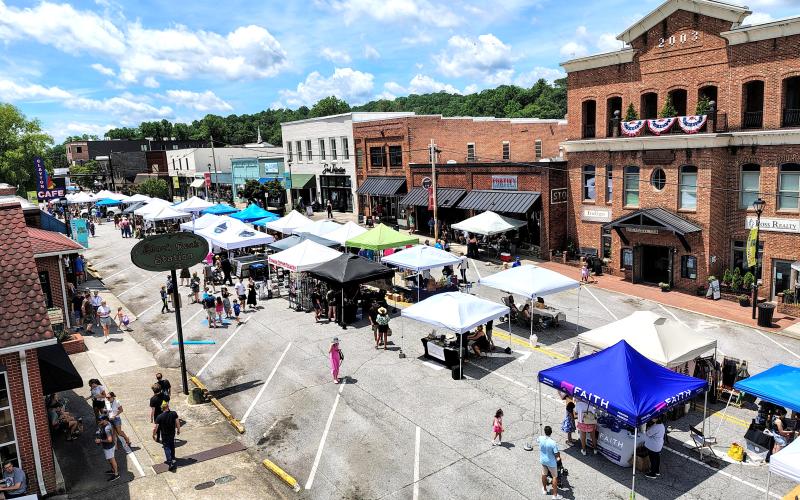 Photo courtesy Conner Horn. This view of Main Street in downtown Clayton from the rooftop of Friends Clayton Grill shows the hundreds of people who came to Rabun County for the second annual Ramshackle on Saturday, June 7.
