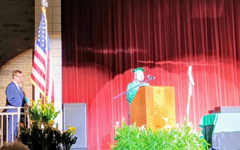 Megan Horn/The Clayton Tribune. Rabun Mountain Education 2025 Student of the Year Rafael Rios Duran speaks during the May 28 graduation ceremony. His message was about how his education had a positive impact on him and that it’s not too late for anyone to get their high school diploma.