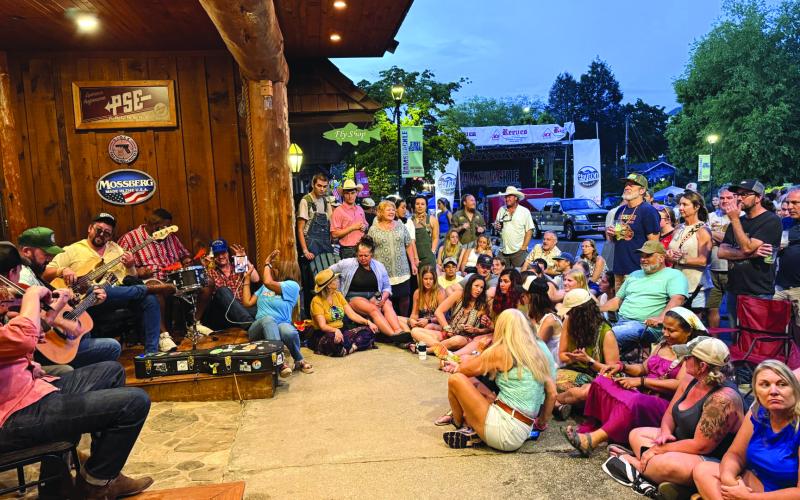 Photo courtesy Sonya Shook. Ramshackle’s headliner Town Mountain was unable to play on the main stage because of the June 7 rainstorm that got the area wet, but that did not keep the band from playing. “We were very thankful they played acoustic in front of Reeves Outdoor Center,” said Sonya Shook of Reeves and the CMBA president. “It was a cool experience for the fans that came and listened to them play.”